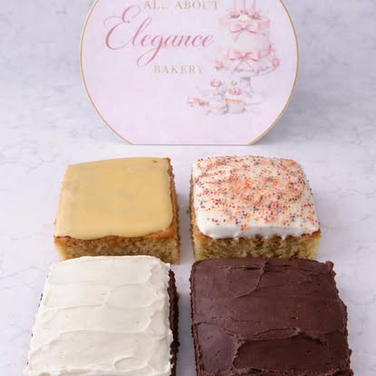 School cake — vanilla and chocolate sponge with icing and sprinkles